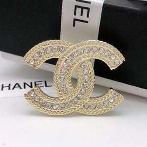 Chanel brooches